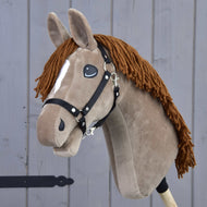 Hobby Horse Oliver in light brown plush with a white stripe, brown yarn mane and black halter, seen at an angle