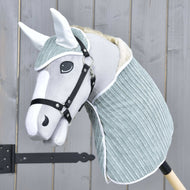 Light grey Hobby Horse in a black halter wearing the Set Manchester Little Green with white satin ears and white trim