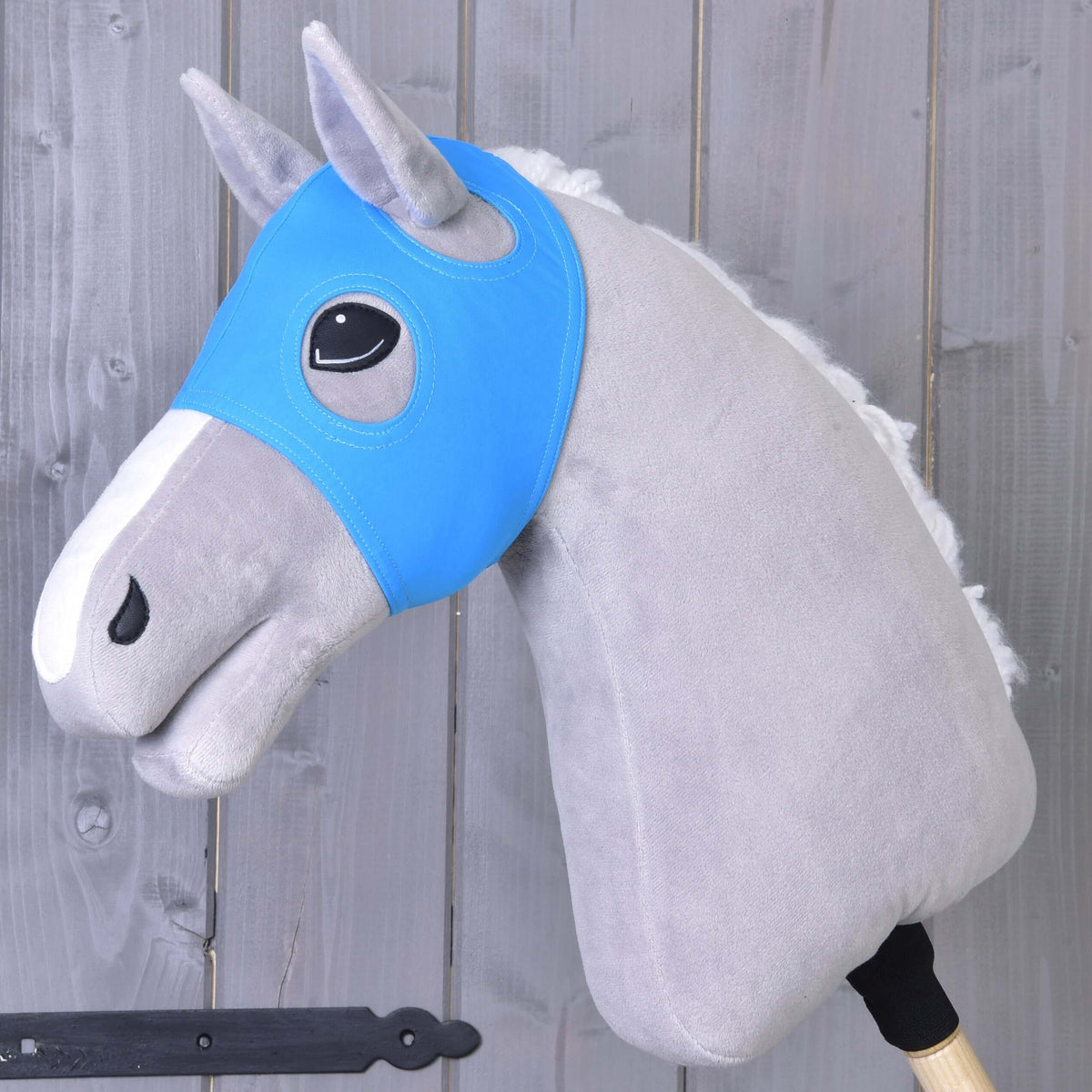Horse Mask without ears Sky by LarDen in bright sky blue stretch fabric on a grey plush Hobby Horse