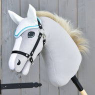 Light grey Hobby Horse with a black halter and cream mane wearing the white crocheted ear bonnet with turquoise trim