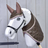 Grey Hobby Horse with a black halter wearing the Set Thermo Chocolate, a shiny brown quilted blanket and ear bonnet