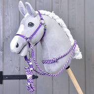 A grey plush Hobby Horse with a white blaze and braided mane wears the purple halter and rope reins of the Set Start Purple