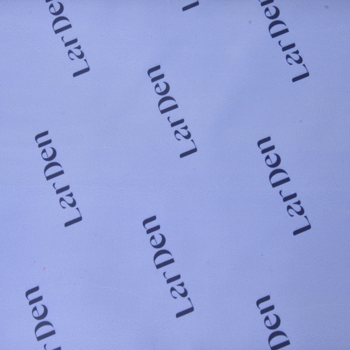 Close-up of the lilac lining inside the Hobby Horse Sports bag, printed with rows of dark LarDen lettering