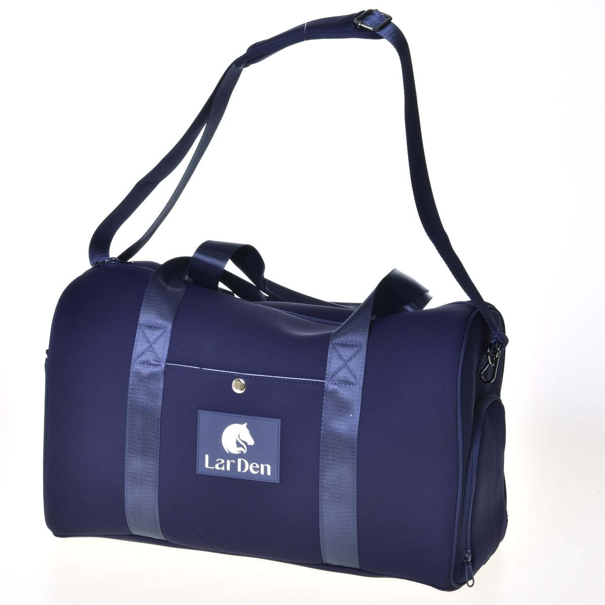 Navy Hobby Horse Sports bag with the long adjustable shoulder strap clipped on and a white logo patch on the front