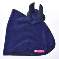 Outer side of the dark blue velvety Hobby Horse blanket with the ear bonnet on top and a pink LarDen label