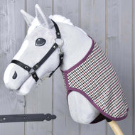 Grey plush Hobby Horse in a black halter wearing the Blanket western Colorado over its neck, plum edging