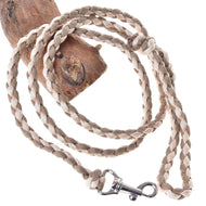 LarDen Hobby Horse Knitted Lead Rope Double Latte, a beige braided paracord lead with silver snap hook on a wooden branch