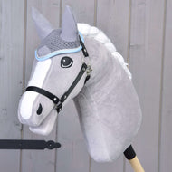 Grey Hobby Horse with a white braided mane and black halter wearing the Ear bonnet crocheted grey with light blue trim