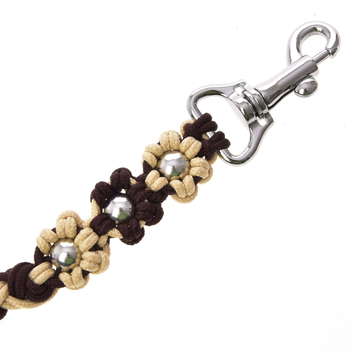 Close-up of three knotted cord flowers with silver beads in brown and beige above the swivel snap hook