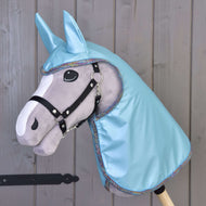 Grey Hobby Horse with black halter wearing the glossy Raincoat Light Blue with ears and rainbow glitter edging