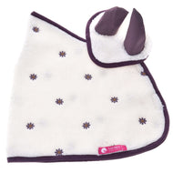Cream sherpa blanket with the plum-eared ear bonnet on top, scattered embroidered flowers and pink LarDen label