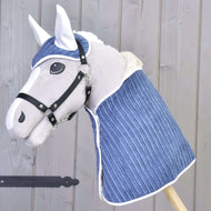 Light grey Hobby Horse wearing the Set Manchester Plum, a blue corduroy ear bonnet and blanket with white trim