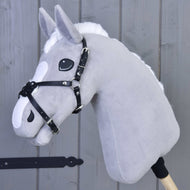 Grey plush Hobby Horse wearing the Noseband Mexico Black Padded by LarDen, black leatherette straps crossing on the nose