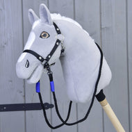 Grey plush Hobby Horse with a black halter and the black rope reins with blue wraps clipped under its chin