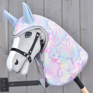 Light grey Hobby Horse in a black halter wearing the Raincoat Pallette, pastel leopard print with light blue ears and silver trim