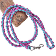 LarDen Hobby Horse Knitted Lead Rope Pinkie-Blue, braided paracord lead with silver snap hook coiled on a wooden log