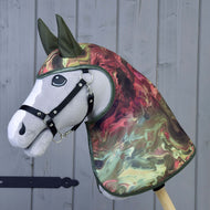 A grey plush Hobby Horse in a black halter wears the Raincoat Galaxy with marbled red and green print and olive ears