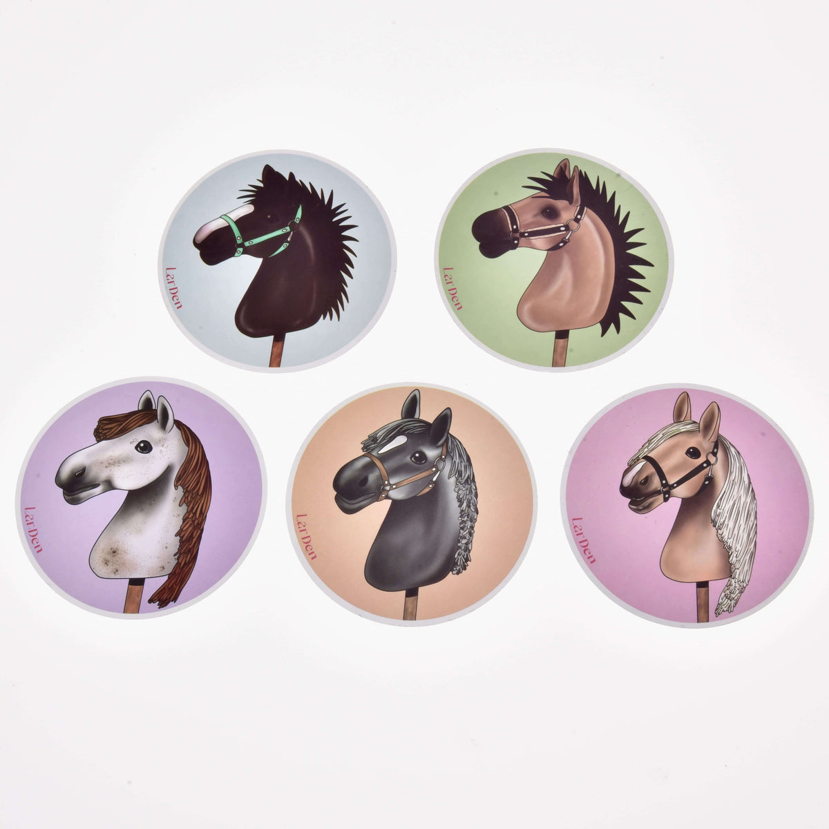 Five Hobby Horse stickers laid out in two rows: dark brown, dun, white, black and palomino horse heads on pastel circles