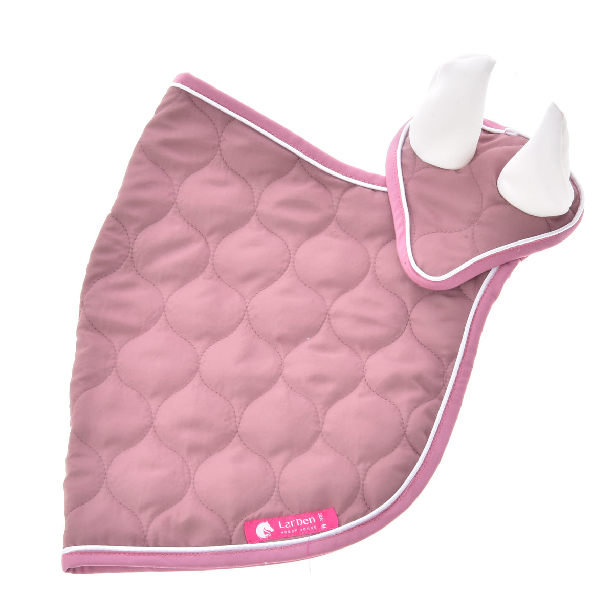 Set laid flat from the outside: wave-quilted dusty pink blanket and ear bonnet with pink binding and a pink LarDen label