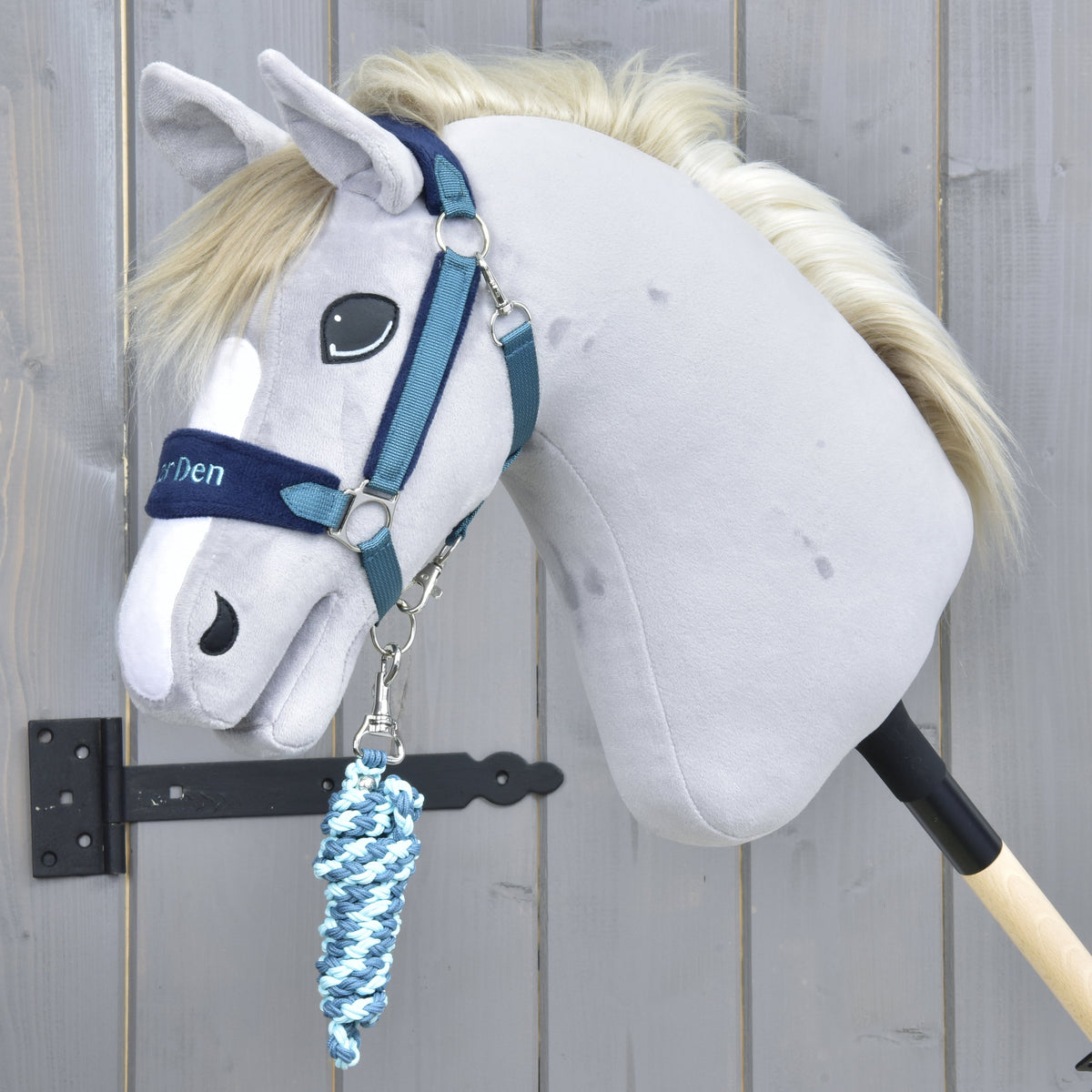 Exclusive Blue halter on a grey Hobby Horse with a cream mane, the light and dark blue lead rope coiled below the chin
