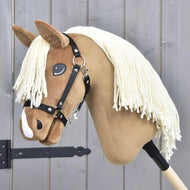 Hobby Horse Smart with Black Halter by LarDen, a light brown plush head with a cream yarn mane and a white nose stripe