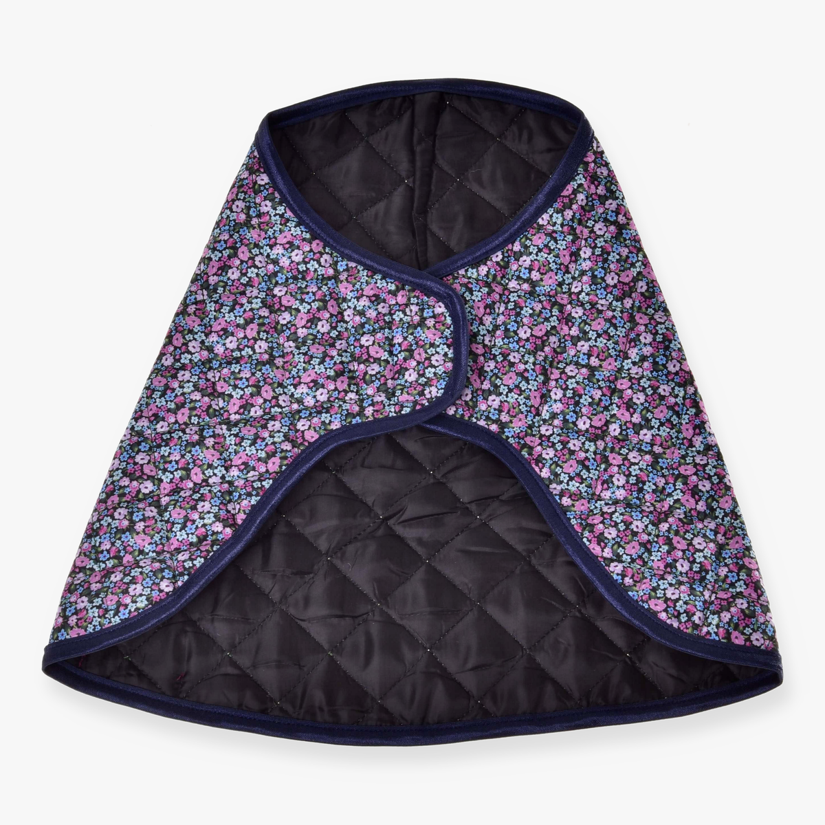 Hobby Horse Blanket Flower by LarDen laid open, black quilted lining inside and a small pink and blue flower print outside
