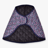 Hobby Horse Blanket Flower by LarDen laid open, black quilted lining inside and a small pink and blue flower print outside