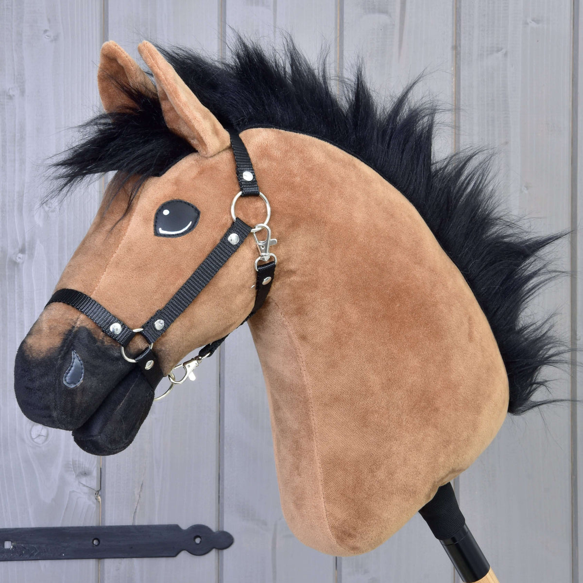 Hobby Horse Cookie with Black Halter by LarDen, a light brown plush head with a shaggy black fur mane and black muzzle