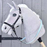 Grey plush Hobby Horse with a black halter and light blue and black rubberized reins buckled under the chin