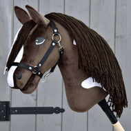Hobby Horse Monte with Black Halter by LarDen, dark brown plush with a white blaze and patches and a long brown yarn mane