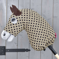 Hobby Horse Protective suit Luxus Design by LarDen in dark brown with a cream chain-link print, worn by a grey Hobby Horse
