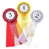 Set Hobby Horse Ribbons by LarDen: three rosettes numbered 1, 2 and 3 in yellow and gold, white and silver, and red