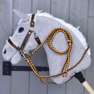 Light grey Hobby Horse in the brown halter with beige fur, with braided orange and brown reins and lead rope