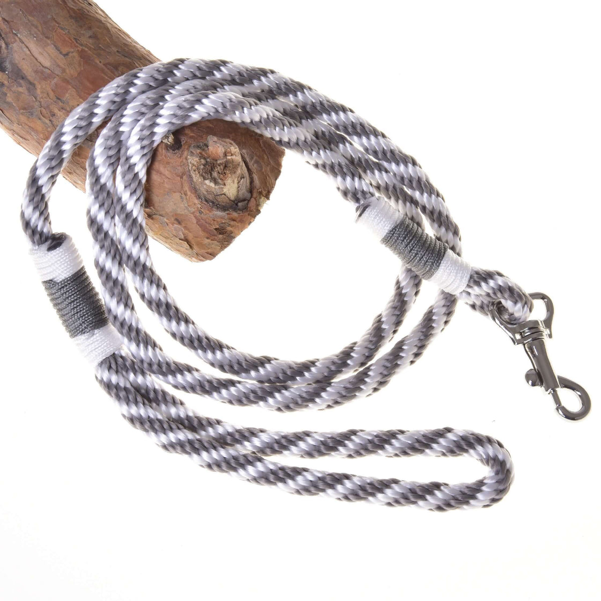 LarDen Hobby Horse Lead Rope Stripe Silver, a silver and white striped lead with metal snap hook draped over a branch