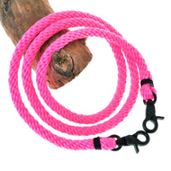 Hobby Horse Reins Pink by LarDen in neon pink braided rope with black wraps and two black snap hooks